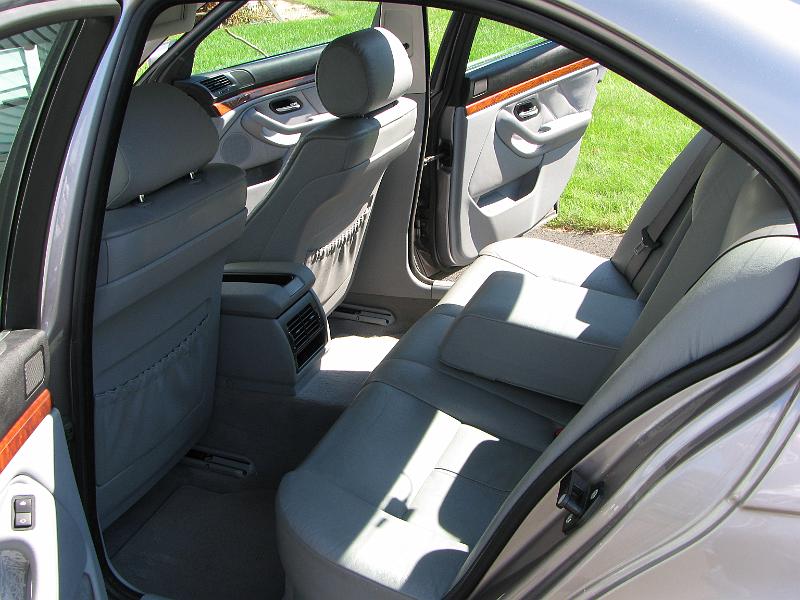 IMG_1437.JPG - Back seat with center armrest - plenty of legroom.