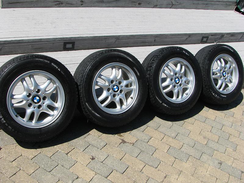 IMG_1454.JPG - Extra set of rims and tires for winter - tires may have one more season in them before needing to be replaced.  Rim are all straight and true.