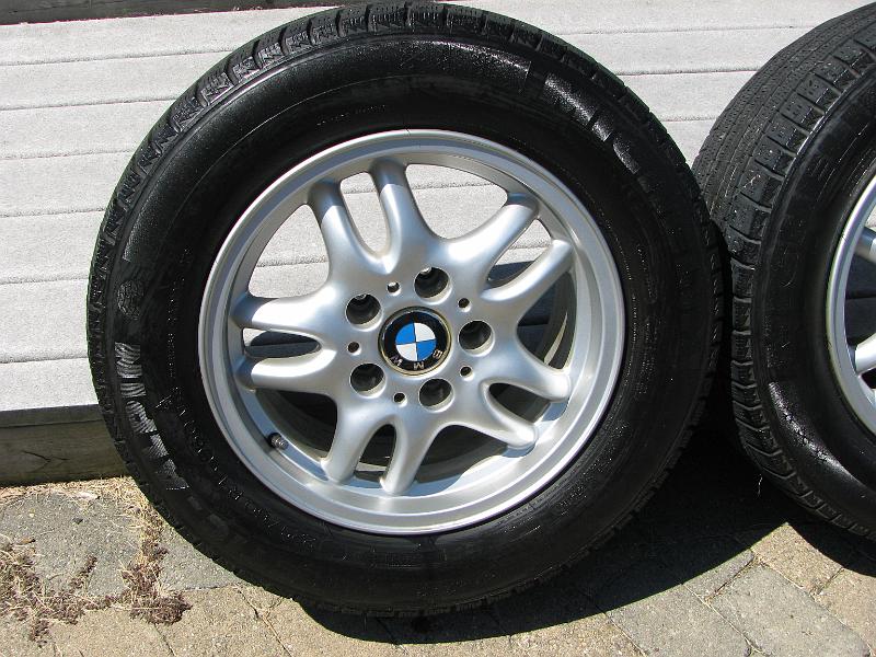 IMG_1455.JPG - Extra set of rims and tires for winter - tires may have one more season in them before needing to be replaced.  Rim are all straight and true.