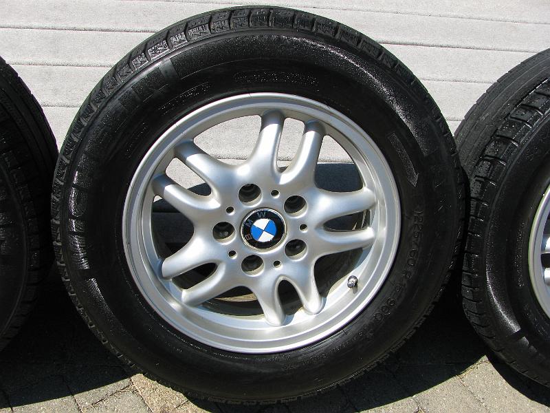 IMG_1456.JPG - Extra set of rims and tires for winter - tires may have one more season in them before needing to be replaced.  Rim are all straight and true.