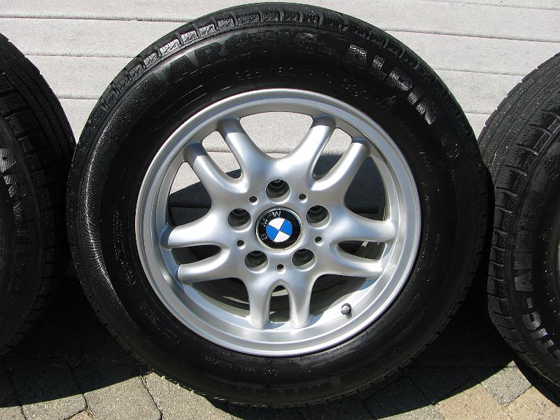 IMG_1457.JPG - Extra set of rims and tires for winter - tires may have one more season in them before needing to be replaced.  Rim are all straight and true.