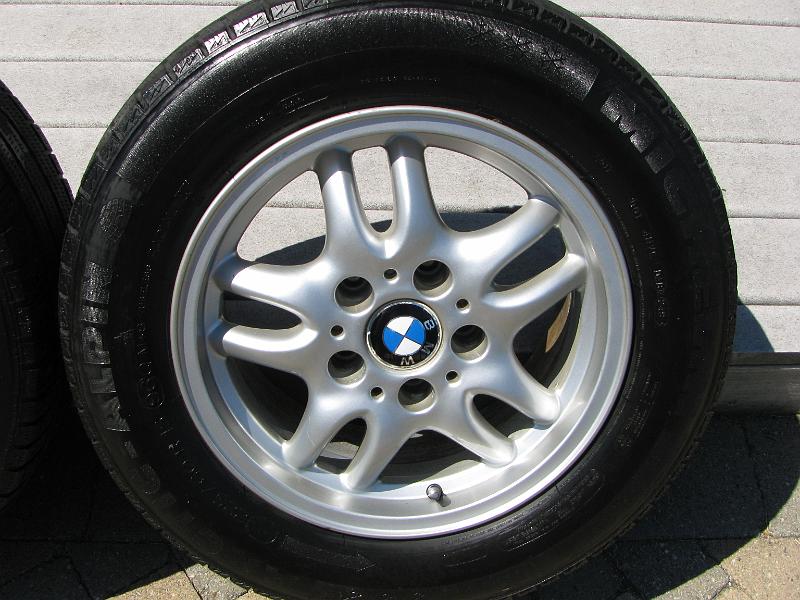 IMG_1458.JPG - Extra set of rims and tires for winter - tires may have one more season in them before needing to be replaced.  Rim are all straight and true.